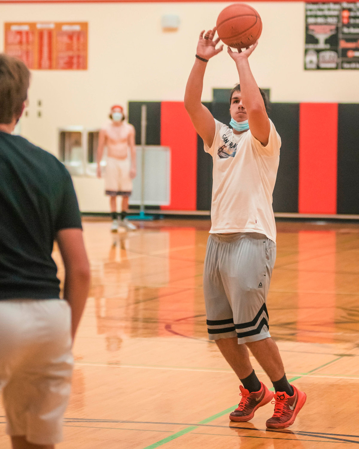 A player shoots from outside during practice at Mossyrock High School on Sunday.