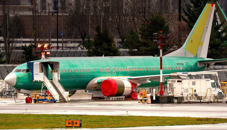 A Boeing 737 MAX airplane, sits outside the Boeing 737 factory adjacent to the Renton Municipal Airport on Monday December 23, 2019.
