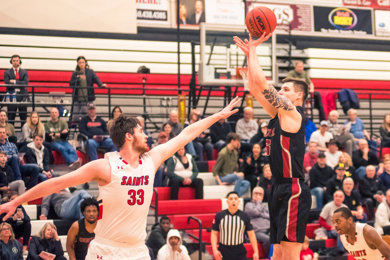 Central's Matt Poquette (25) goes up for a shot during a game Thursday night at Saint Martin's University.