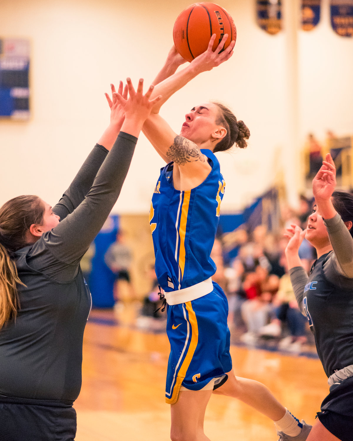 Centralia's Caitlinn Yenne (12) goes up for a shot during a women's basketball game against S.P.S.C.C Wednesday night at Centralia College.