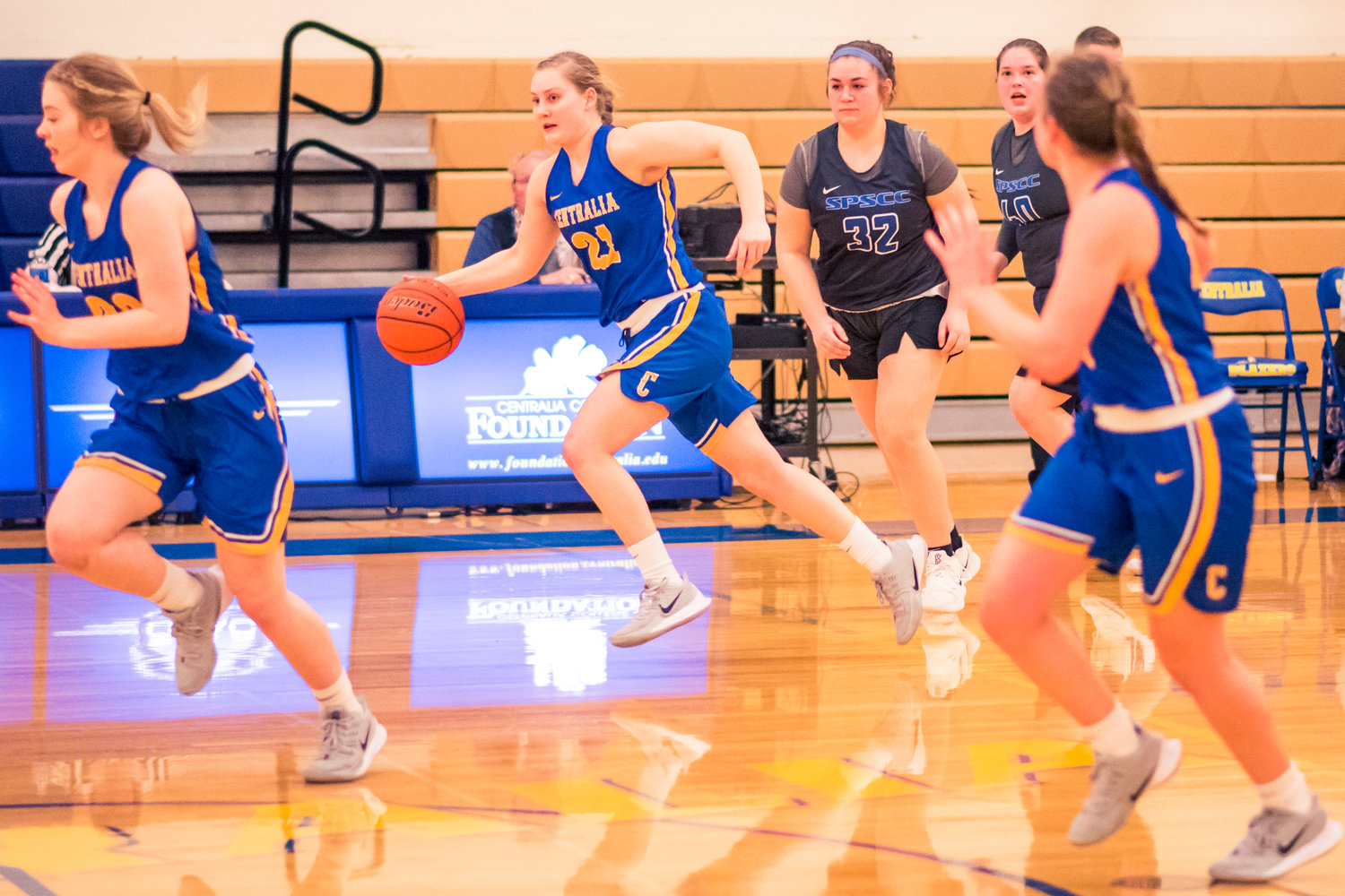 Centralia's Rachel Wilkerson (21) takes the ball down court during a women's basketball game against S.P.S.C.C Wednesday night at Centralia College.