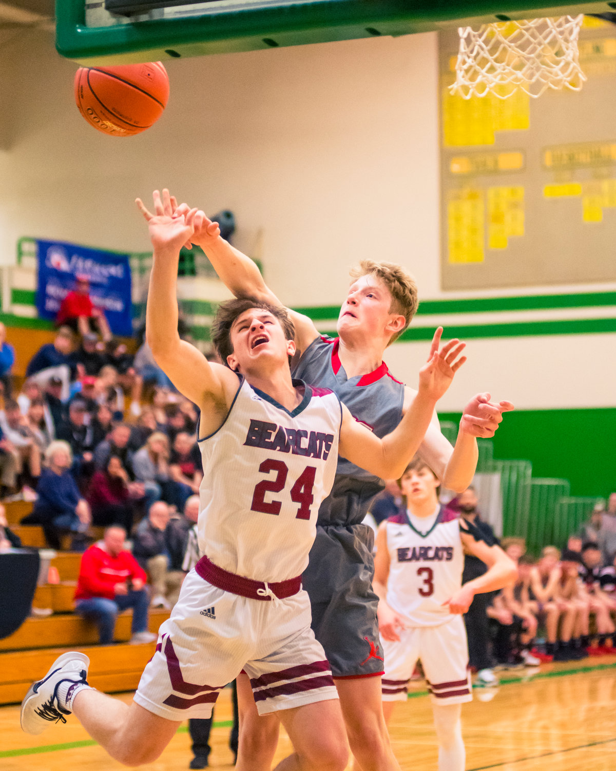 W.F. West's Max Taylor (24) is fouled on his way to the hoop during a game against Jacks Thursday night at Tumwater High School.