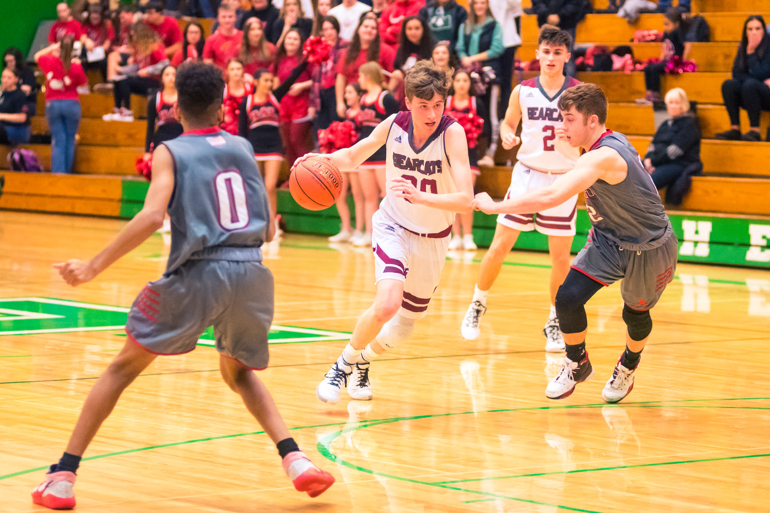 W.F. West's Tyler Speck (30) dribbles towards the hoop during a game against Jacks Thursday night at Tumwater High School.