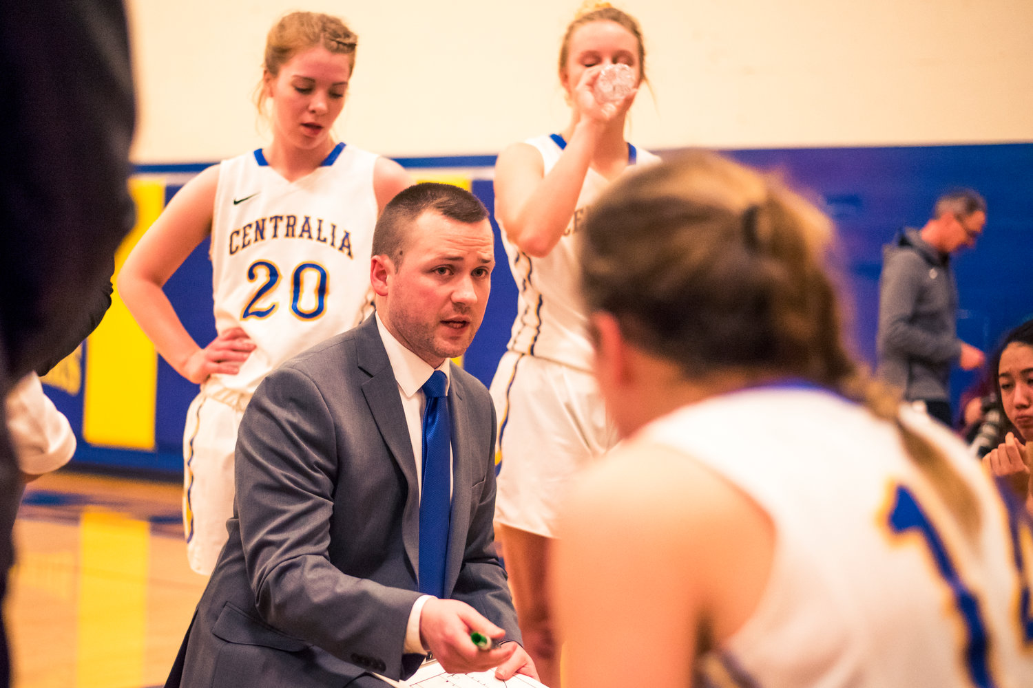 Centralia's coach Caleb Sells talks to players during a game against Grays Harbor Wednesday night at Centralia College.