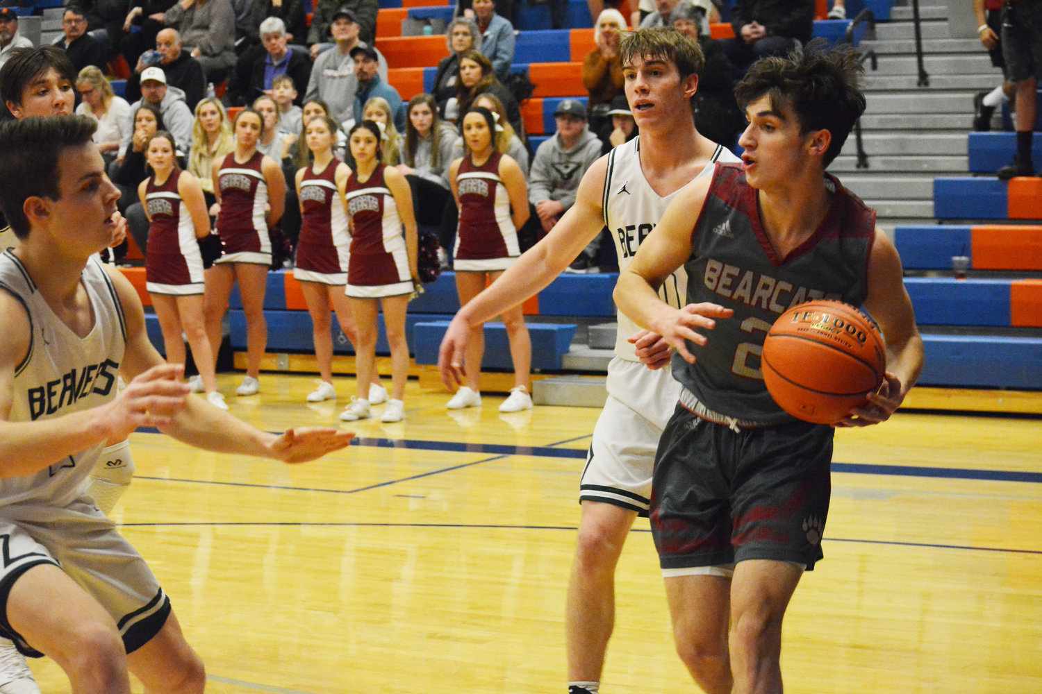W.F. West's Kayden Kelly looks for an open pass near the bucket against Woodland on Tuesday.