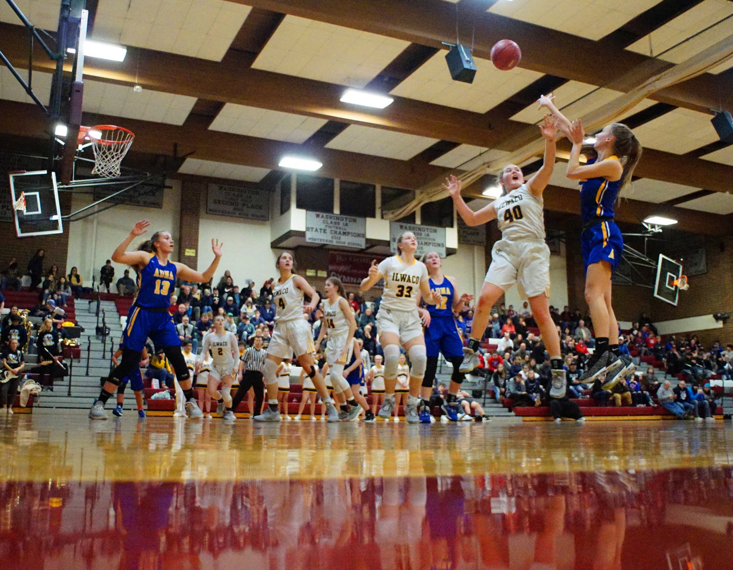 An Adna player rises for a jumper against Ilwaco during the Pirates' 42-26 loss to the Fishermen on Saturday. (Rob Hilson / For The Chronicle)
