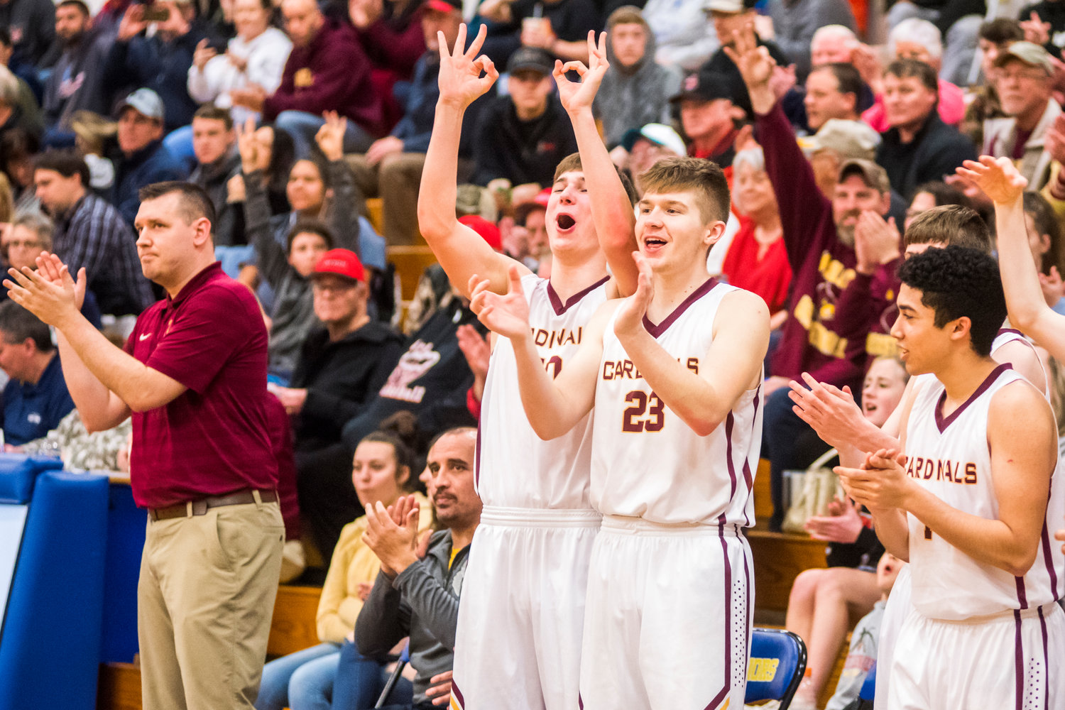 Winlock players cheer during a game against Northwest Christian Saturday night in Rochester.