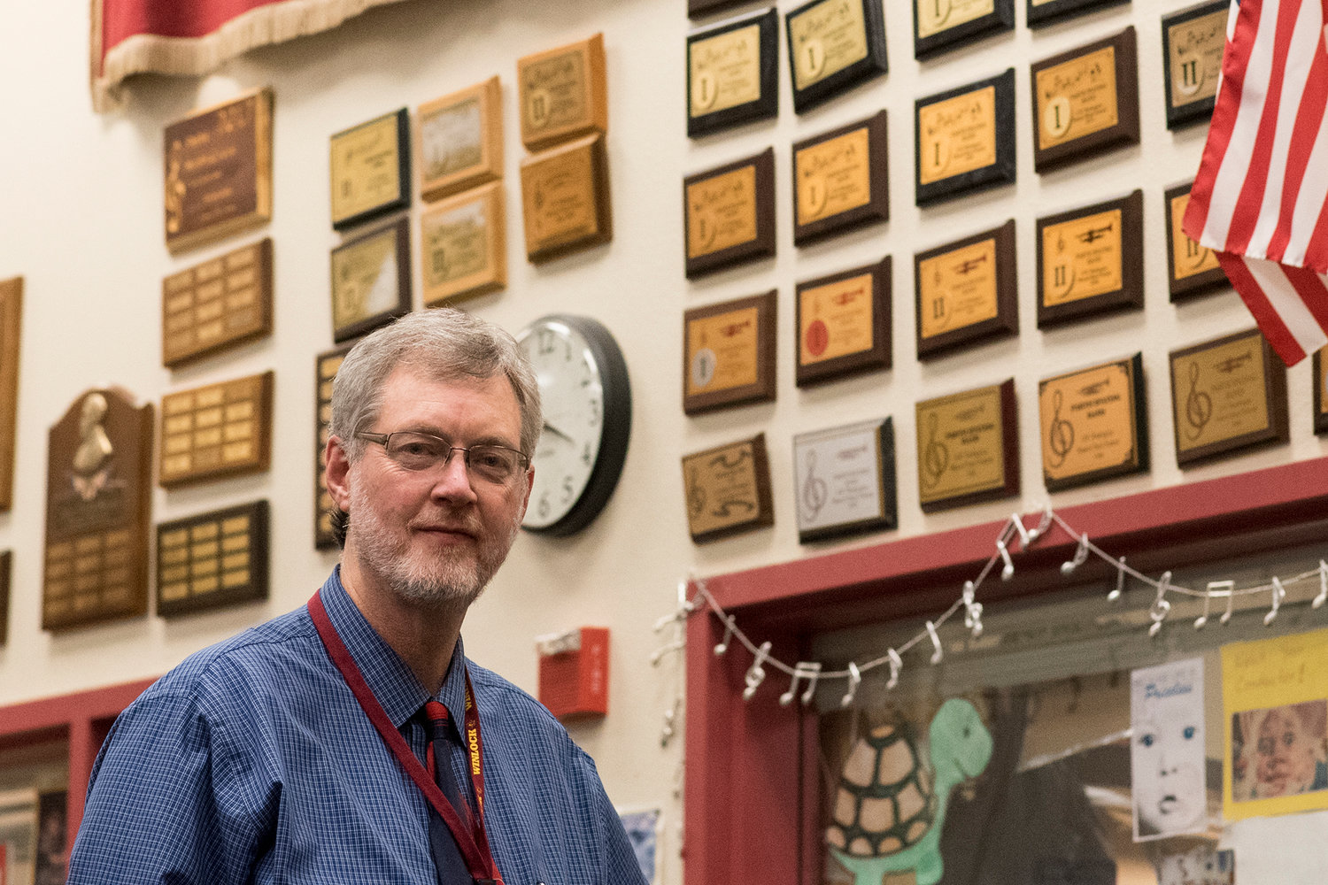 Karl Scarborough, Winlock music teacher, stands in front of his office in the music room in this 2020 Chronicle file photo.