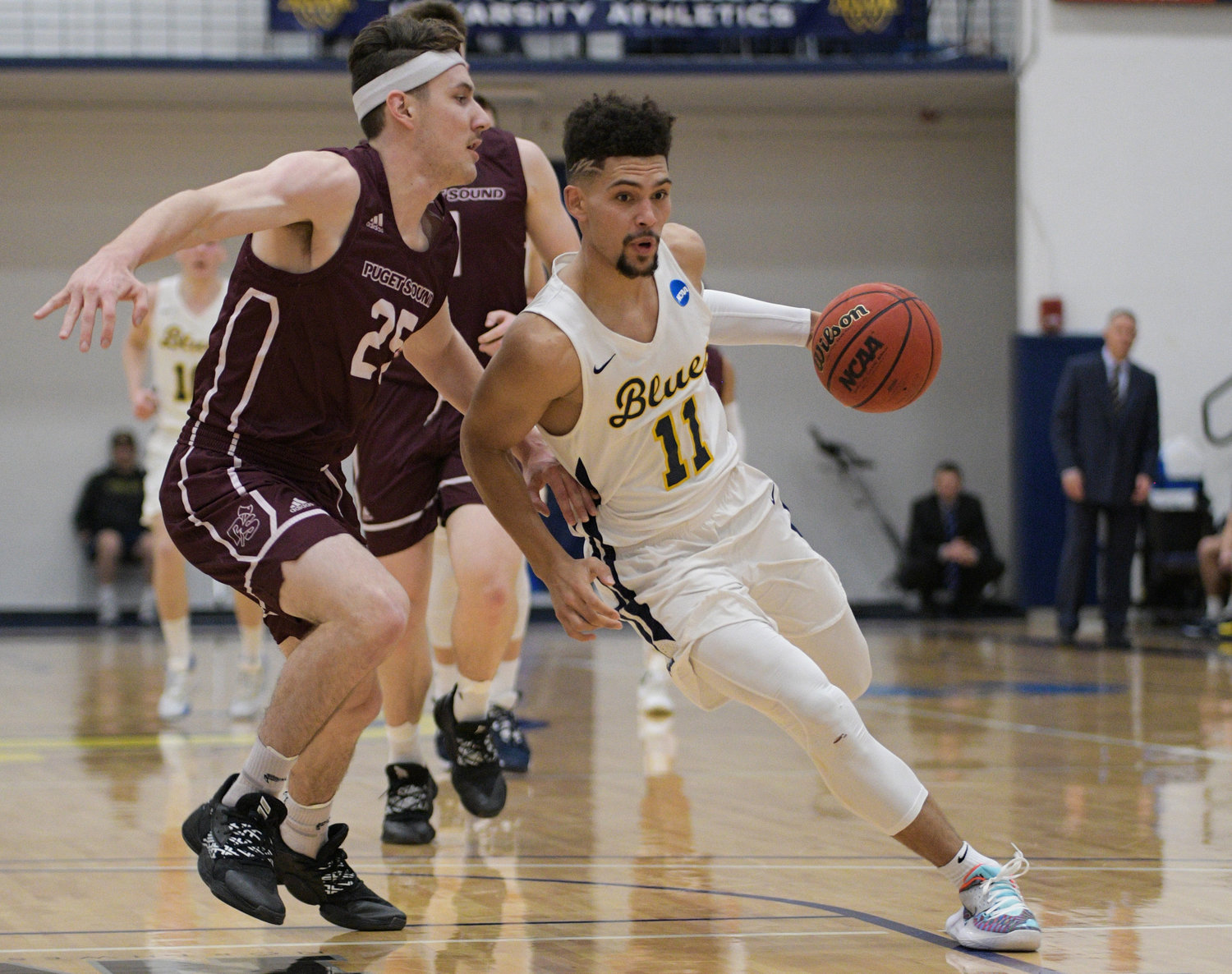 Whitman College senior guard Jaron Kirkley (11), has built himself into a starter after three seasons of limited playing time. (Courtesy of Whitman Athletics)