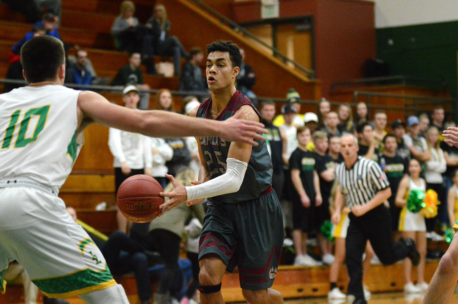 W.F. West's Jordan Thomas passes the ball against Lynden on Saturday night at Mount Vernon High School in a 2A regional boys basketball game.
