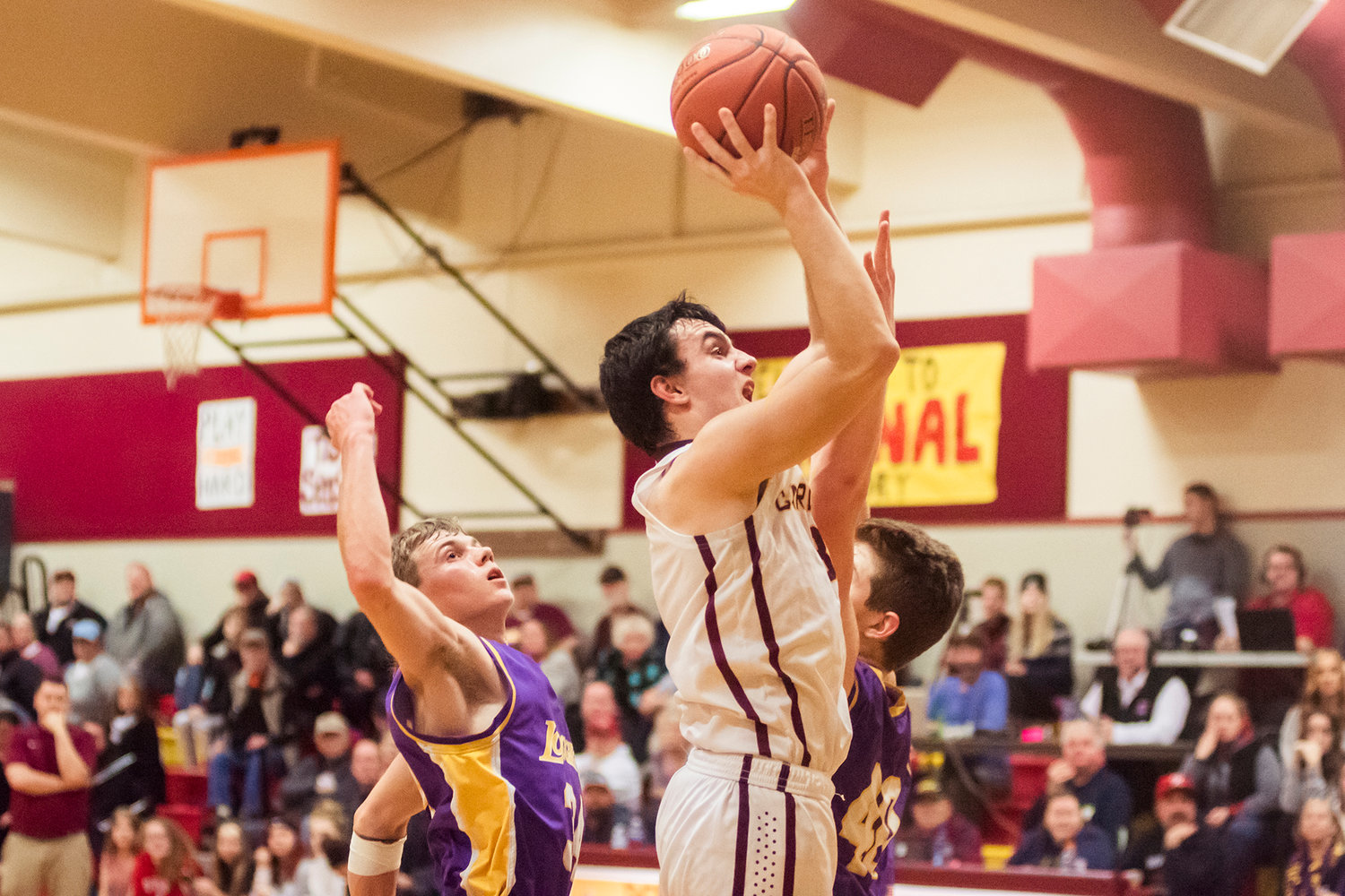 Cardinal's Bryce Cline (3) goes up for a shot Wednesday night at Winlock High School.