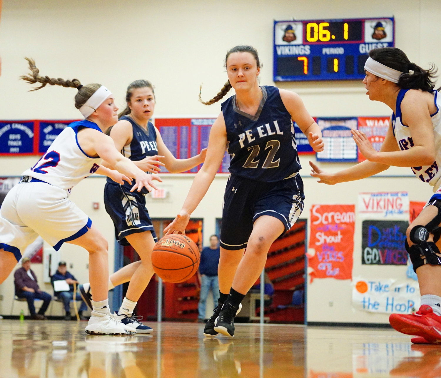 Trojan's Megan Krafczyk (22) dribbles the ball down court during a game against Willapa Valley Thursday night in Menlo.