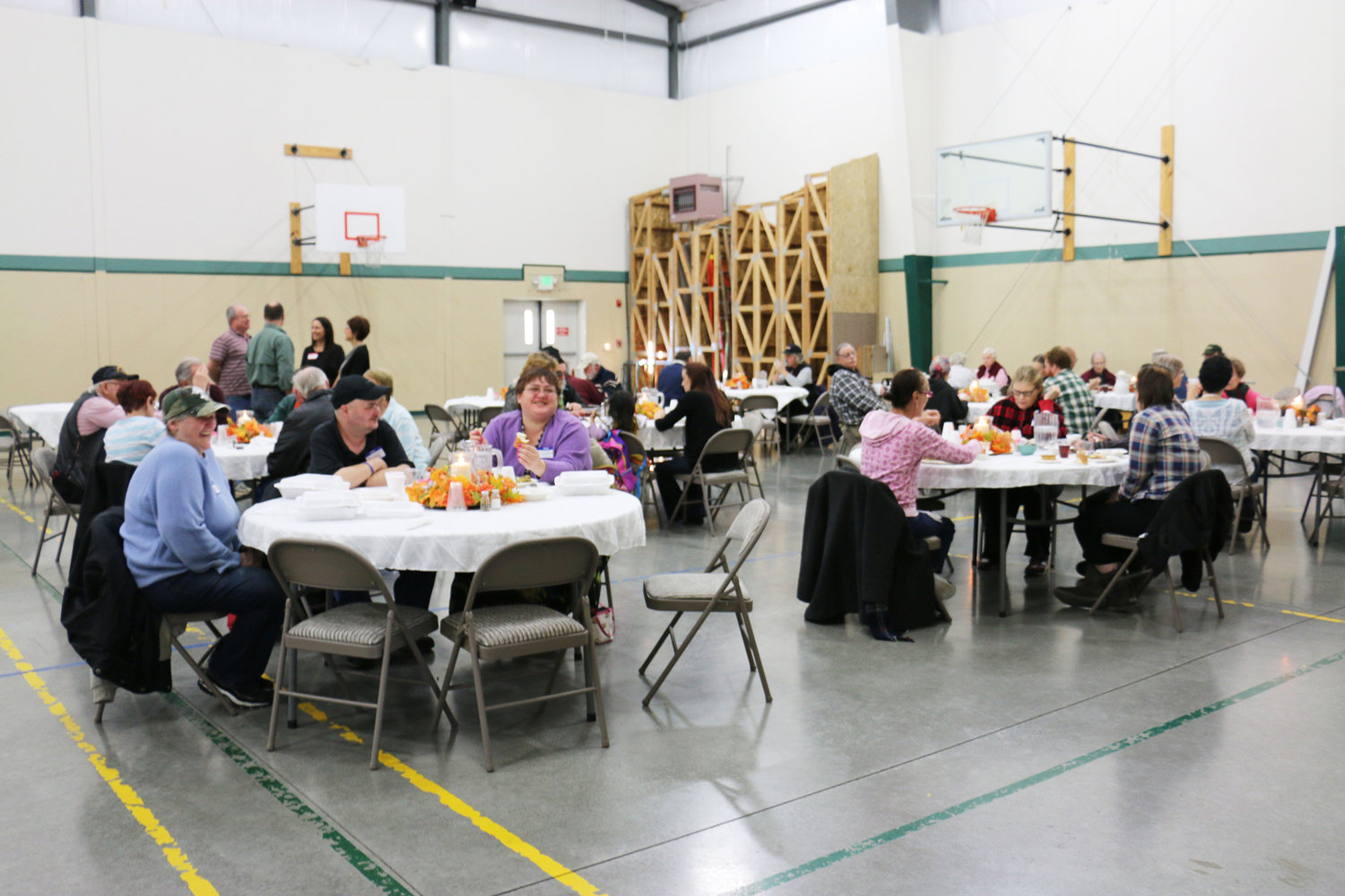 Tables are filled with people eating a free Thanksgiving meal at Immanuel Lutheran Church in this Chronicle file photo.