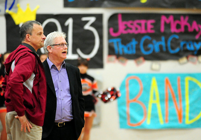W.F. West head coach Henri Weeks, left, talks with Centralia head coach Tom Kelly prior to the start of an Evergreen 2A Conference girls basketball game at W.F. West in 2013. Kelly, after a year off from the prep game, was hired on Thursday to replace Weeks as W.F. West's head coach. Weeks resigned in May. 