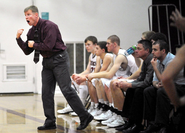 Former W.F. West boys head coach Ryan Robertson reacts from the bench during a league matchup in Chehalis in 2015.