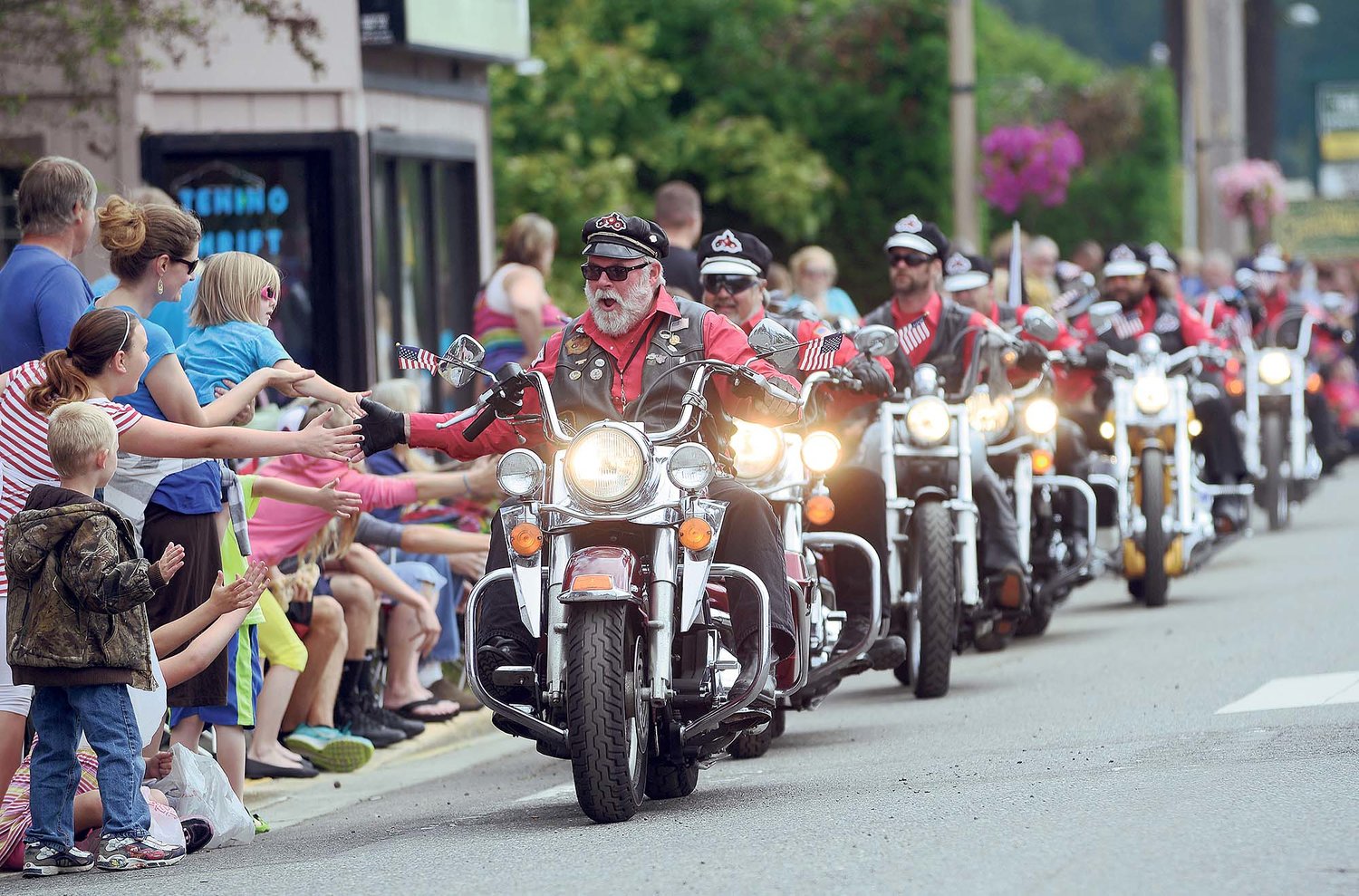 The Tenino Motorcycle Drill Team warms up the crowd prior to the start of a prior Oregon Trail Days parade.