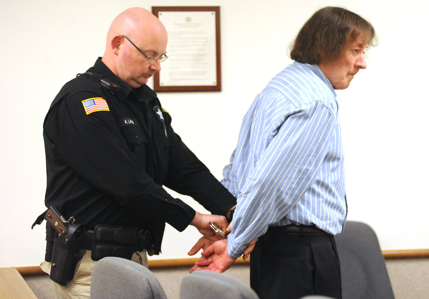 Kenneth Slert is handcuffed in February 2010, following a jury’s guilty verdict in Lewis County Superior Court. Slert was convicted of second-degree murder in connection with a Packwood campsite shooting in 2000.