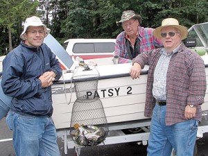 Buddy Rose / The Chronicle Mayfield Lake anglers are catching limits of rainbow trout. From left, Garrett Lordahl, George Sherman and Dave Watson, all from Tenino, caught these 15 'bows in the vicinity of Ike Kinswa State Park last week. The trio was trolling near the surface on an overcast day and fast enough to avoid hooking the small salmon smolts that are coming into the lake from the Tilton River.