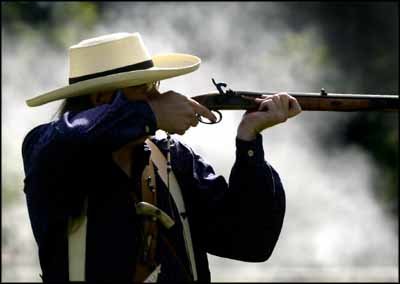 Chris Miller, Olympia, takes aim with his .54-caliber Hawking black powder long rifle at 75 yards during the black powder shooting competition at a prior Oregon Trail Days.