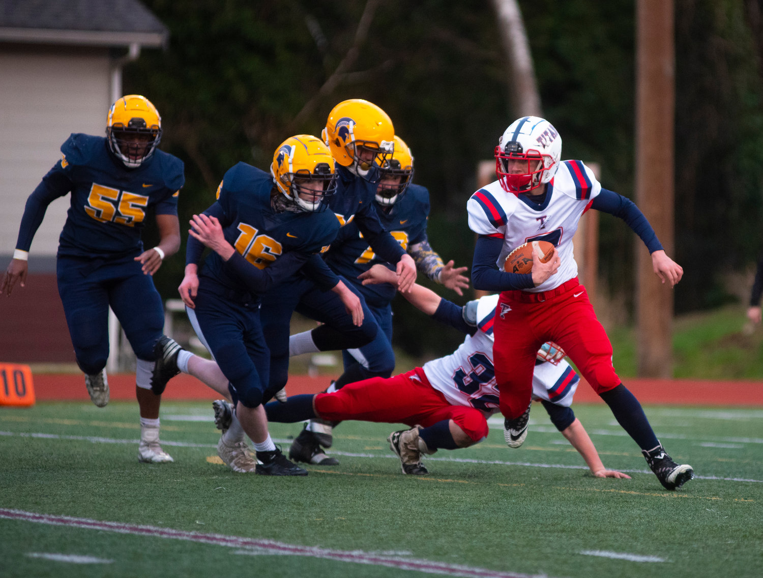 Pe Ell-Willapa Valley running back Aaiden Lee rushes around end against Forks on Saturday.
