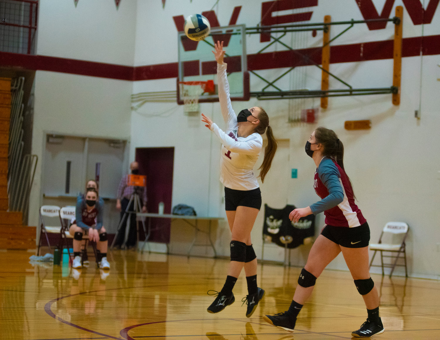 W.F. West libero Alisha Anderson (1) spikes the ball against Aberdeen on Thursday.