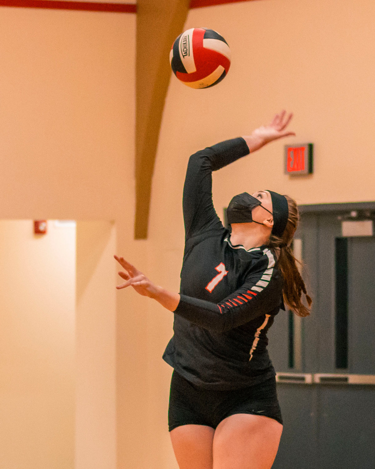 Mossyrock’s Morgan Houghtelling (7) goes up for a serve during a match against Pe Ell on Thursday.