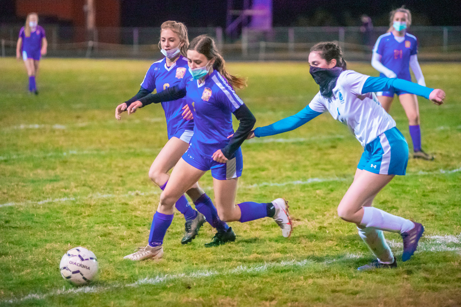 Onalaska’s Haille Brown (6) and Cierra Russ (1) control the ball down the field during a game Wednesday night.