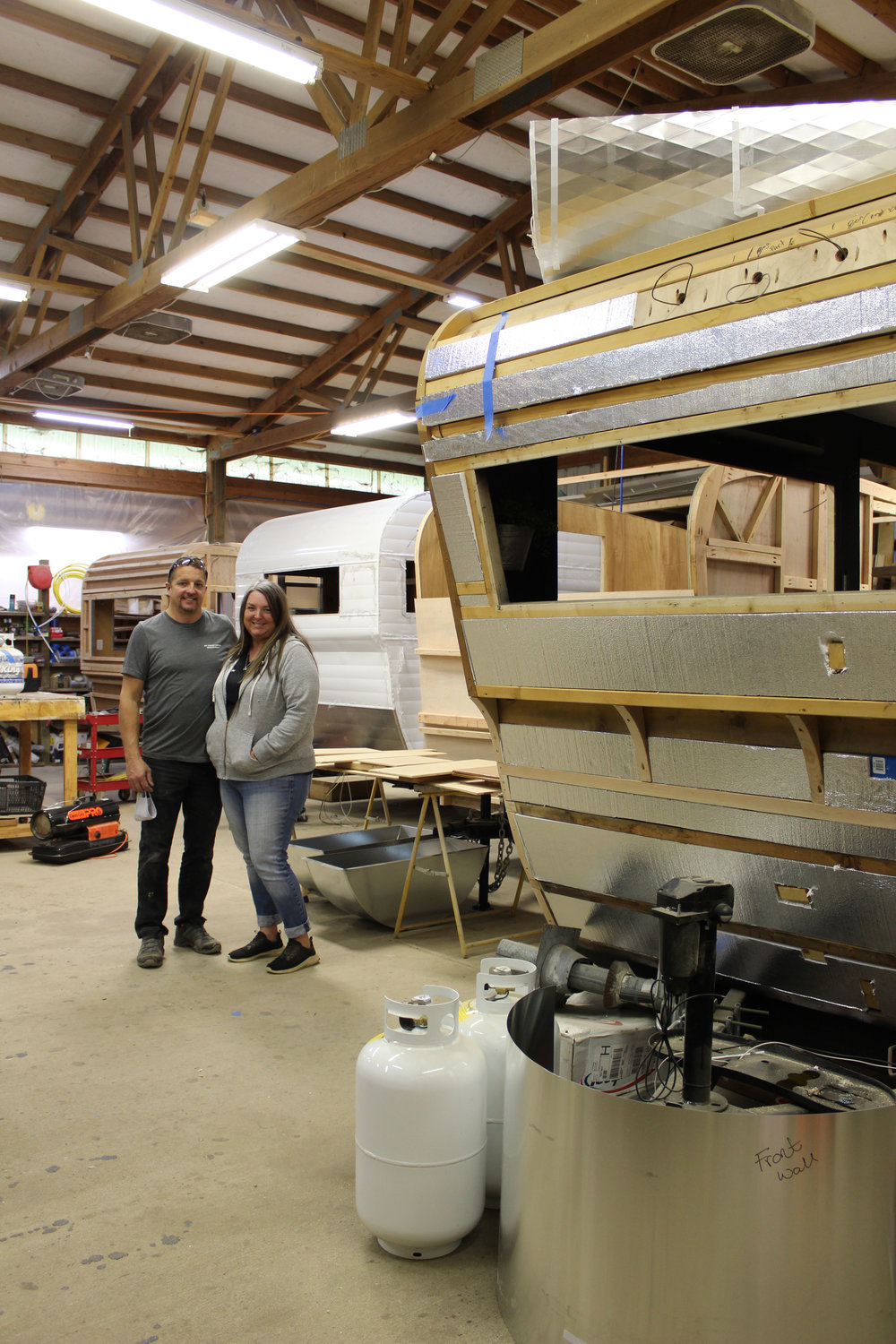 Down River Vintage Trailer Restoration owners Jeremy and Rene Ralston in their Winlock area workshop, along with their four latest vintage trailer projects. The couple said a vintage trailer restoration can take anywhere between 1,500-2,000 man hours.
