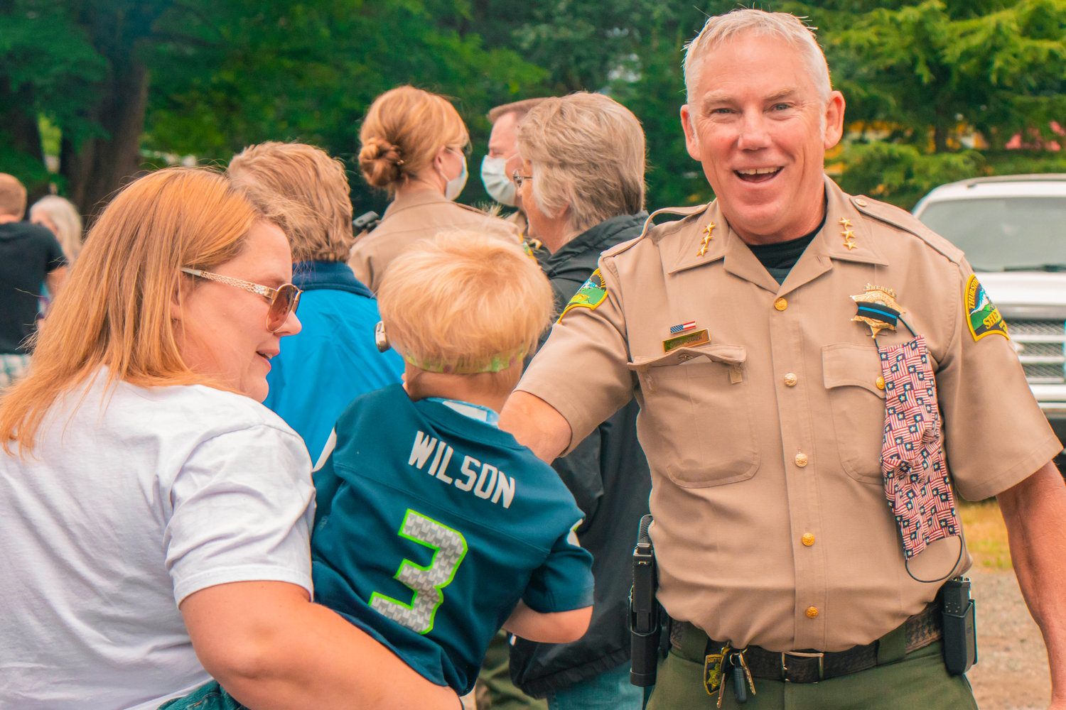 FILE PHOTO — Thurston County Sheriff John Snaza smiles as he greets attendees of a Blue Lives Matter rally in Rochester.