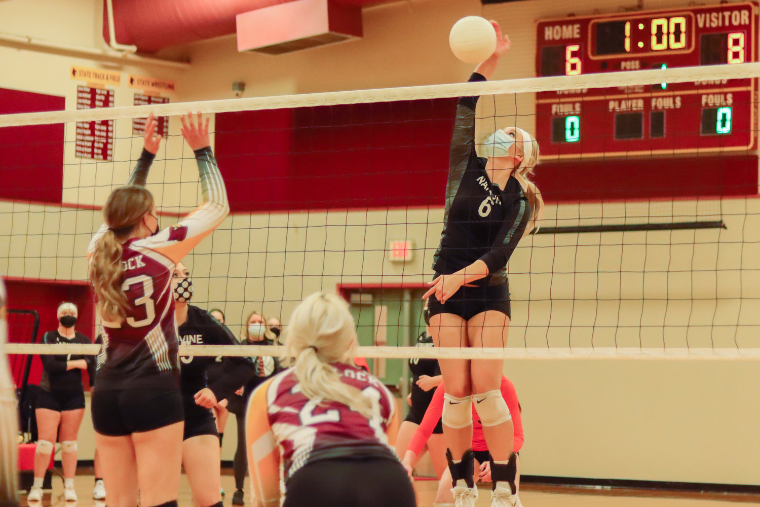 Napavine's Haily Murray (6) hits the ball over the net during a volleyball game in Winlock on Tuesday.