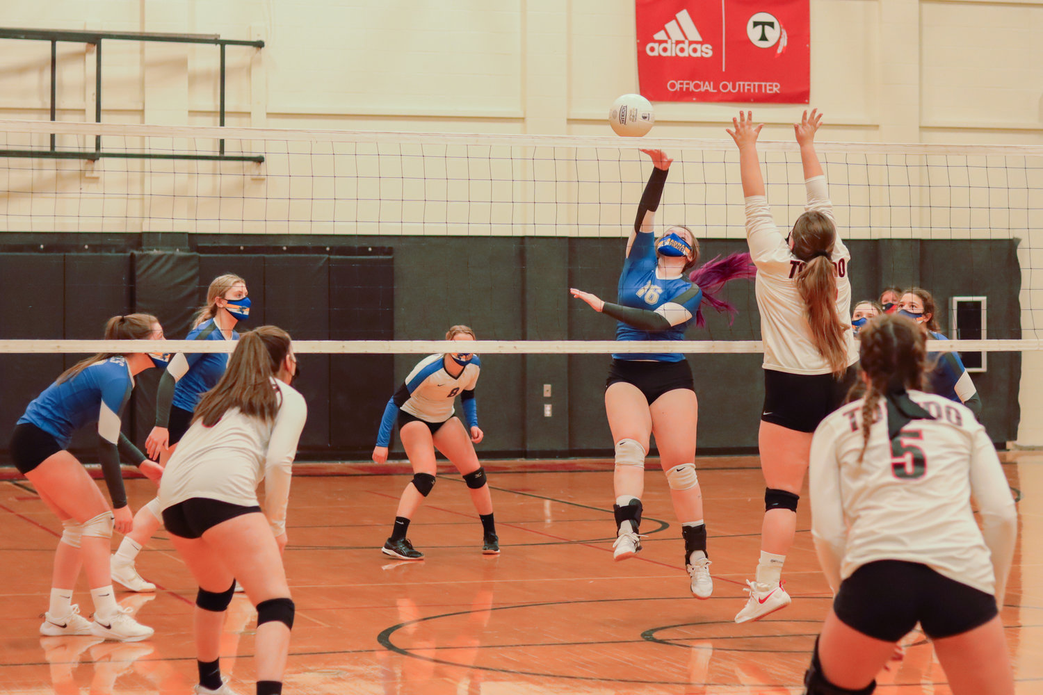 Adna's Elisha Giese (16) hits the ball over the net during a game in Toledo on Tuesday.