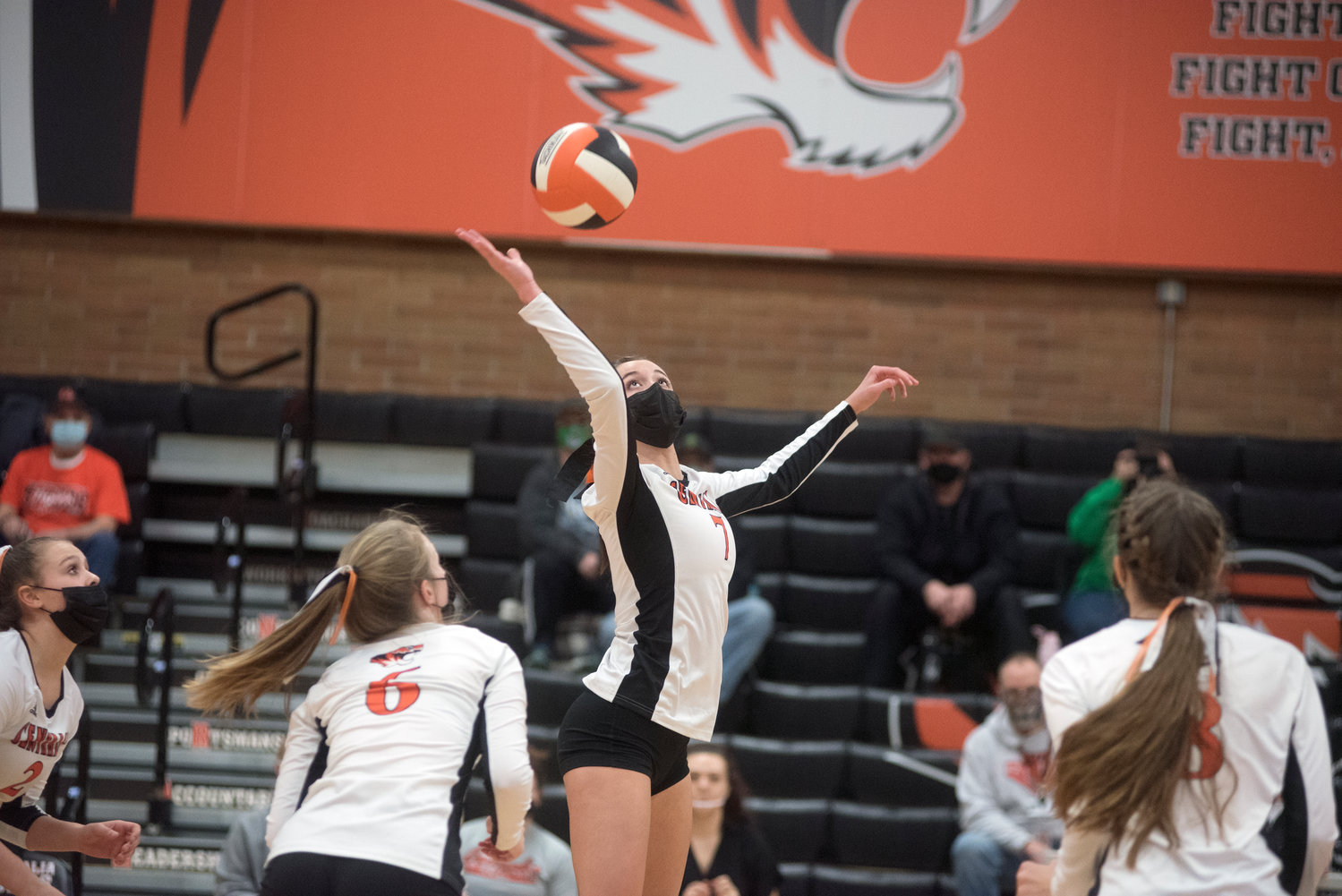 Centralia senior Faith Waterfield rises up to smack the ball against Tumwater in the 2021 season opener Tuesday night in Centralia.