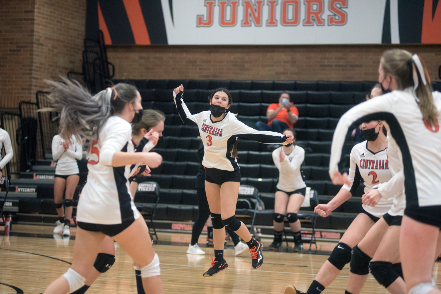 Centralia junior Ella Orr (3) celebrates with her teammates after the Tigers score against Tumwater Tuesday night.