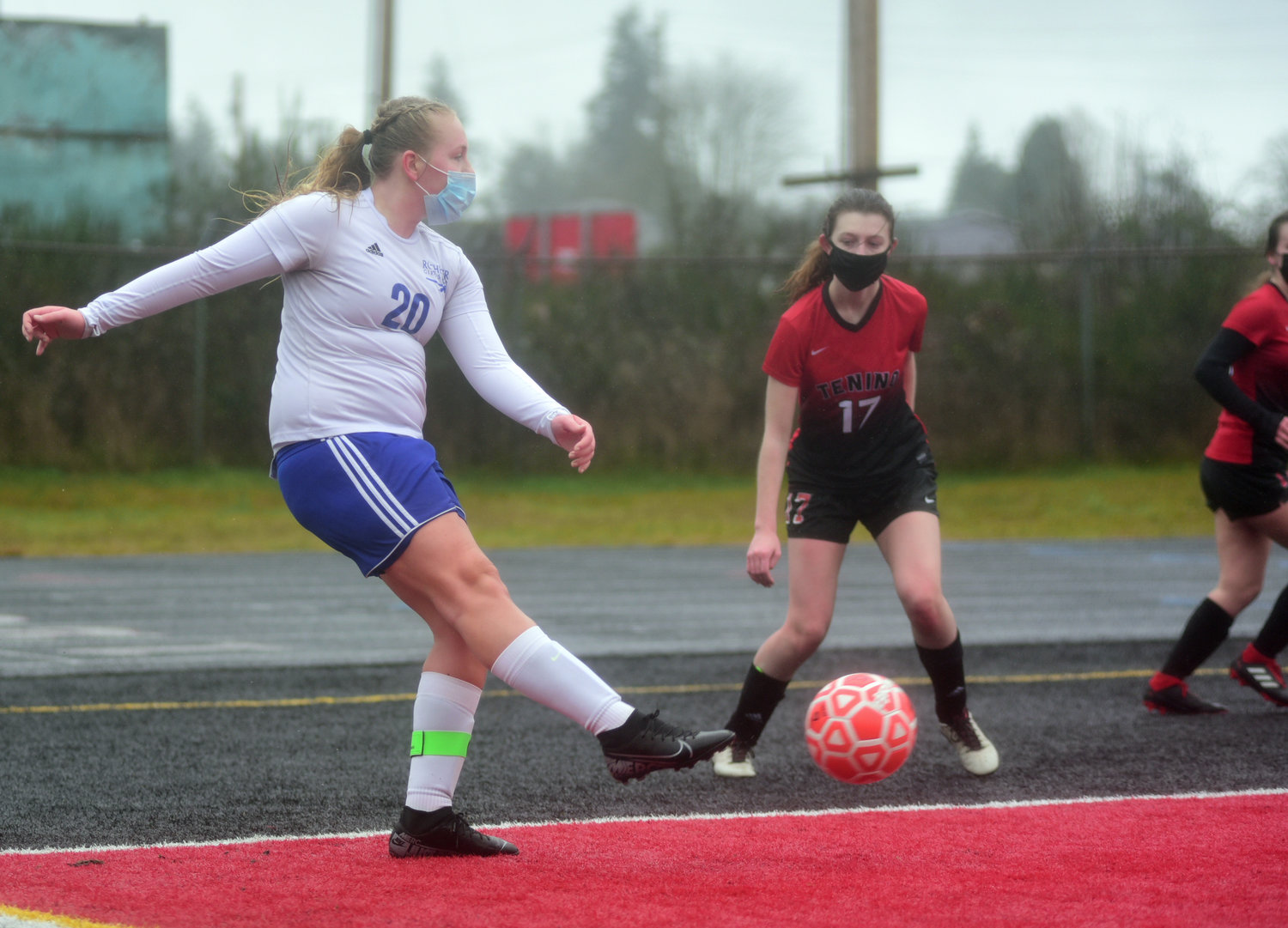FILE PHOTO - Rochester senior Megan Elkins boots the ball away from the Warriors' goal on earlier this season.