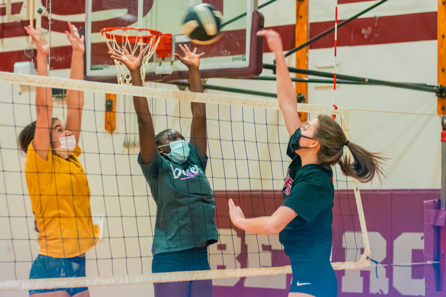 Bearcat athletes sport masks during volleyball practice at W.F. West High School Wednesday afternoon in Chehalis.