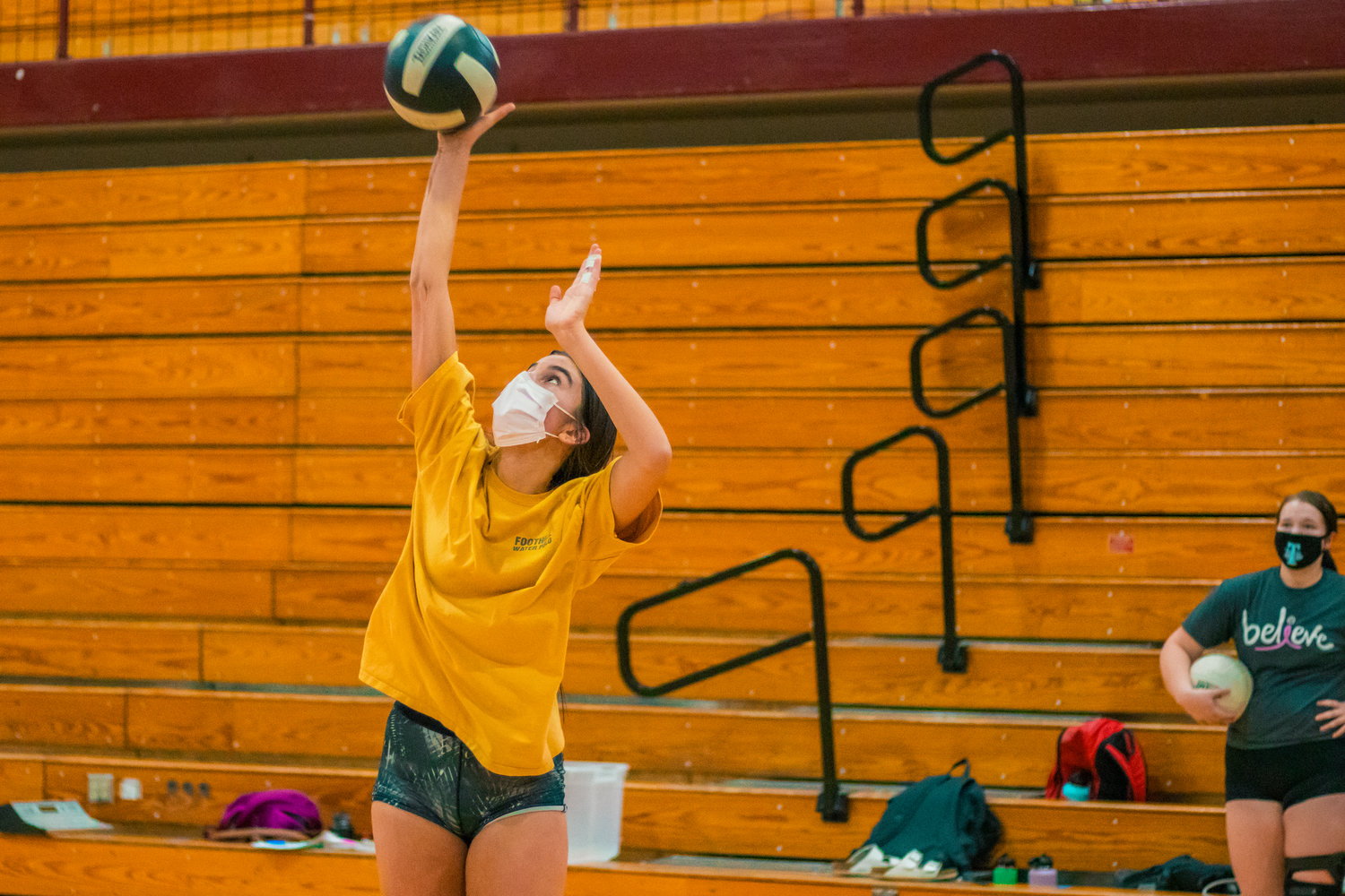 W.F. West's Anna White practices serving Wednesday afternoon in Chehalis.