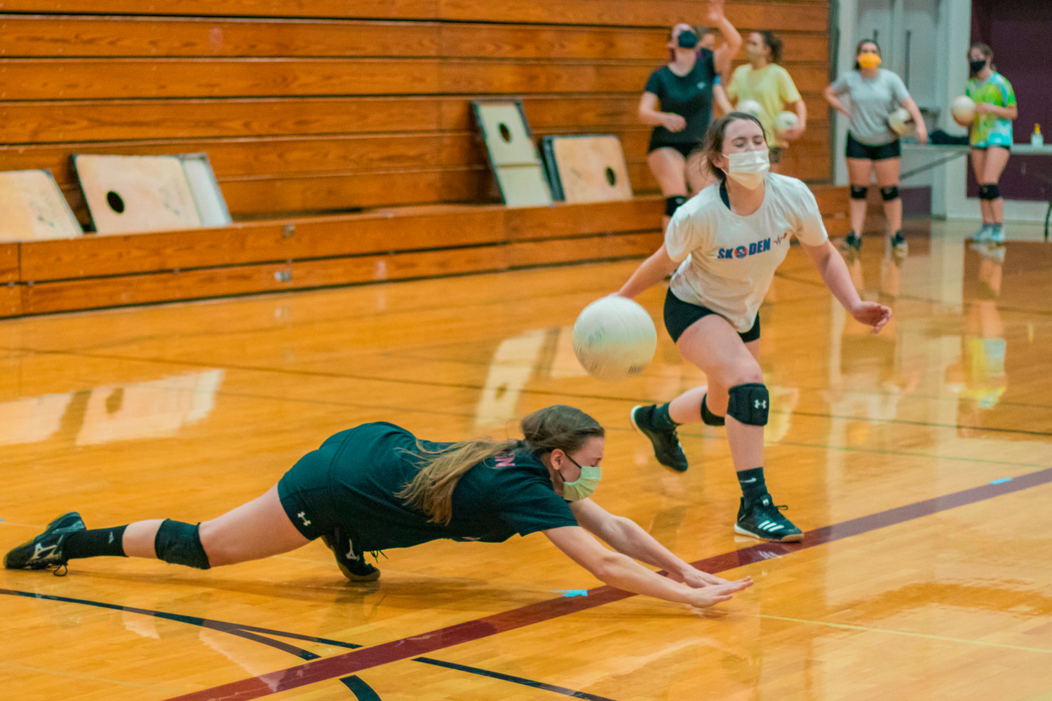 FILE PHOTO — Bearcat athletes sport masks during volleyball practice at W.F. West High School last week in Chehalis.
