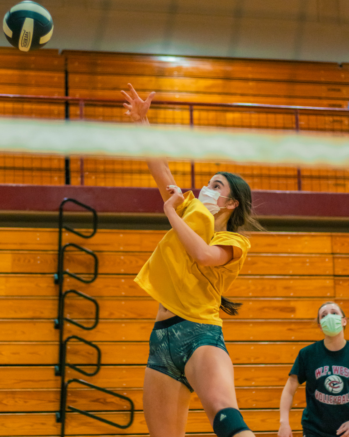 W.F. West's Anna White hits the ball over the net during practice Wednesday afternoon in Chehalis.