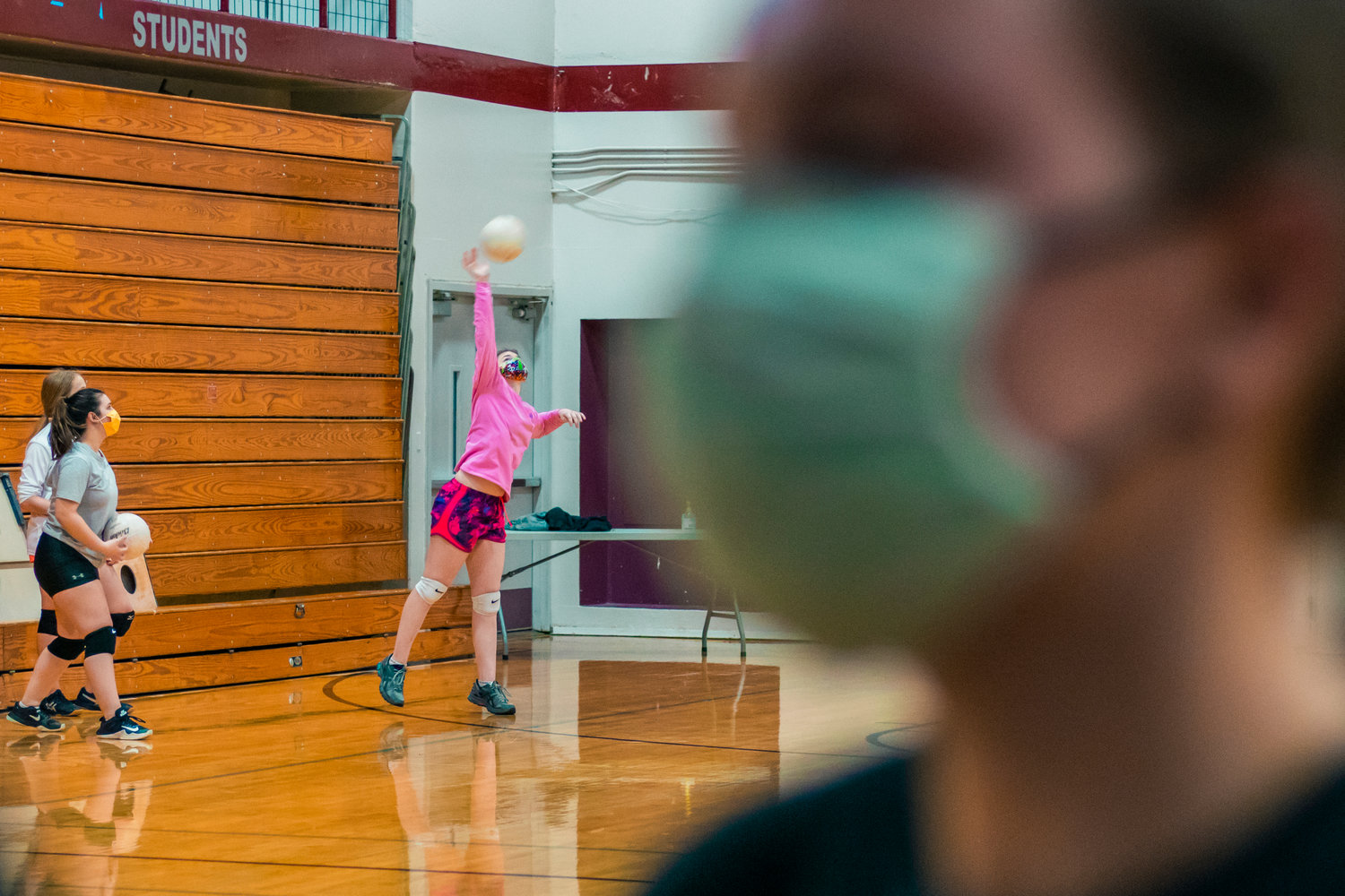 W.F. West's athletes practice serving the volleyball during practice Wednesday afternoon in Chehalis.