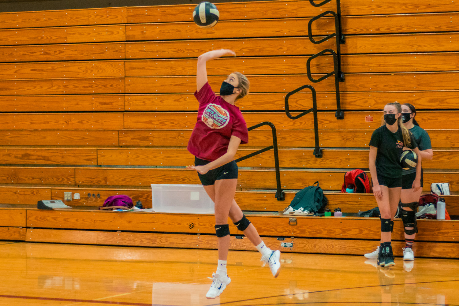 W.F. West's Ava Olsen practices serving Wednesday afternoon in Chehalis.