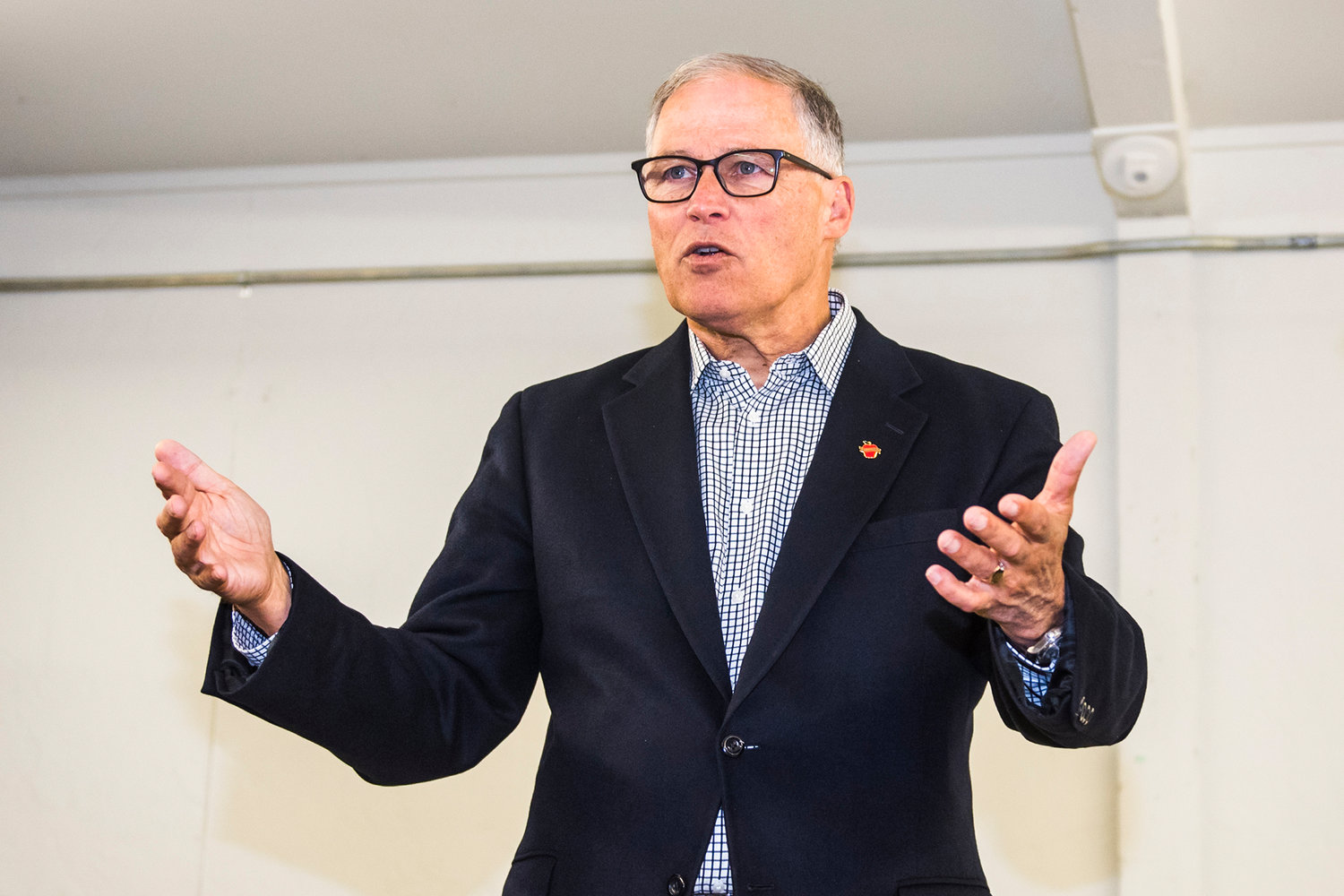 FILE PHOTO — Gov. Jay Inslee talks during a tour of the cold weather shelter at the Southwest Washington Fairgrounds in Chehalis in 2019.