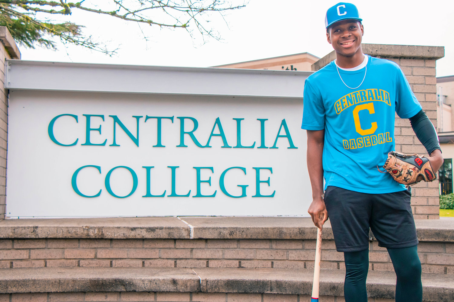 Ferron Moss smiles and poses for a photo Tuesday afternoon at Centralia College.