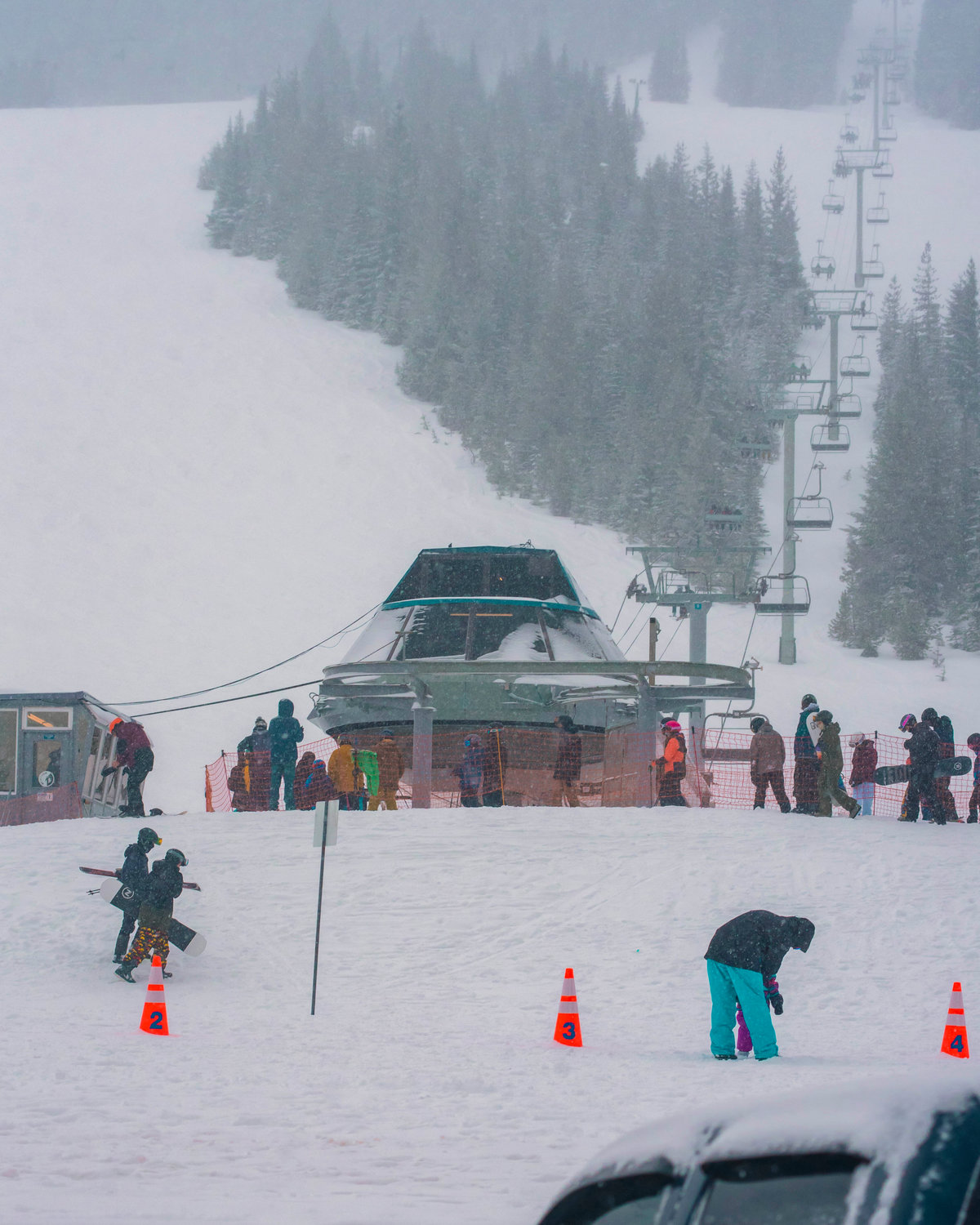 Crowds line up to ride ‘The Great White Express’ at the White Pass Ski Area on Sunday.
