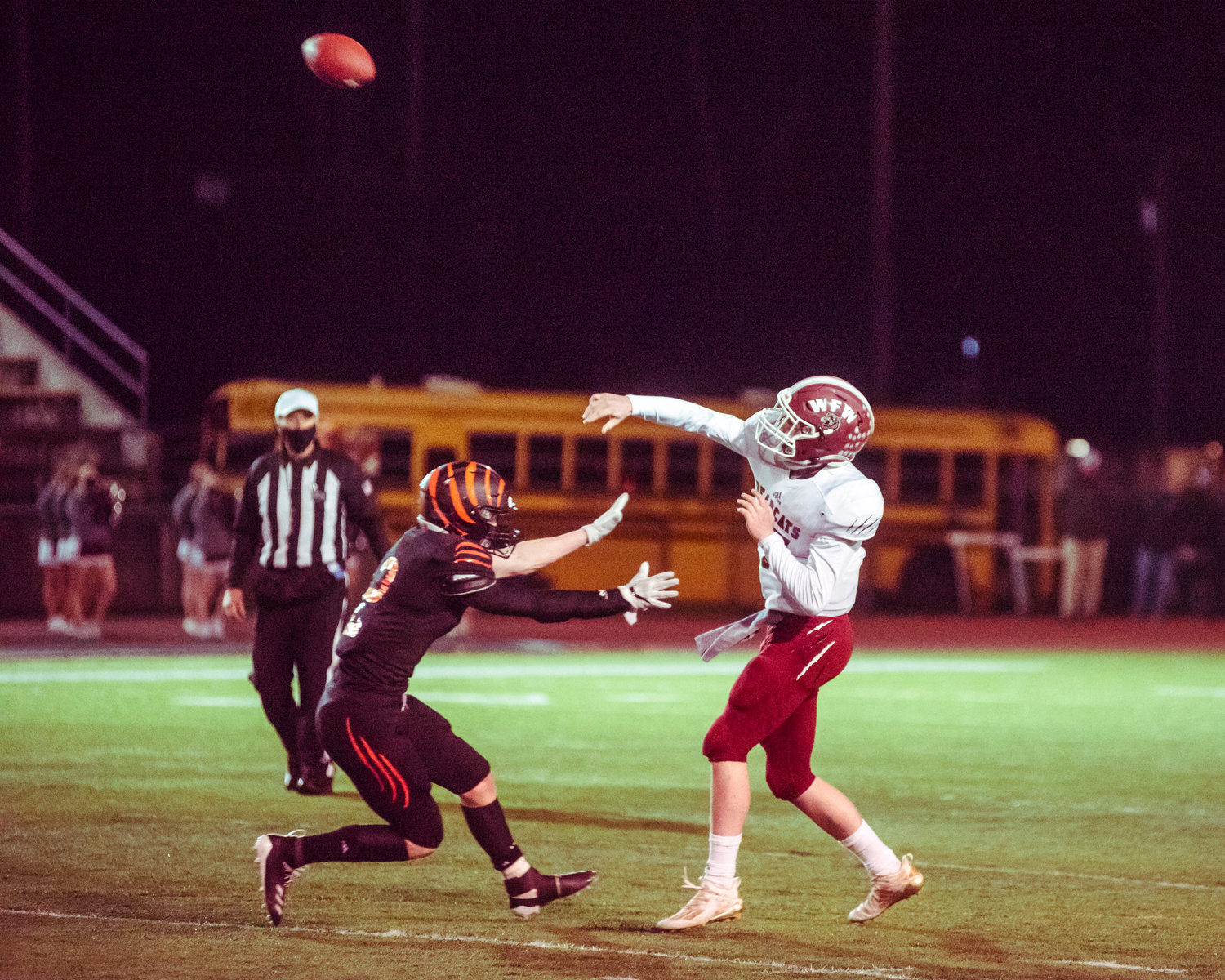 W.F. West's Quarterback Gavin Fugate (17) throws a pass during the Swamp Cup football game against Centralia Saturday night at Tiger Stadium.