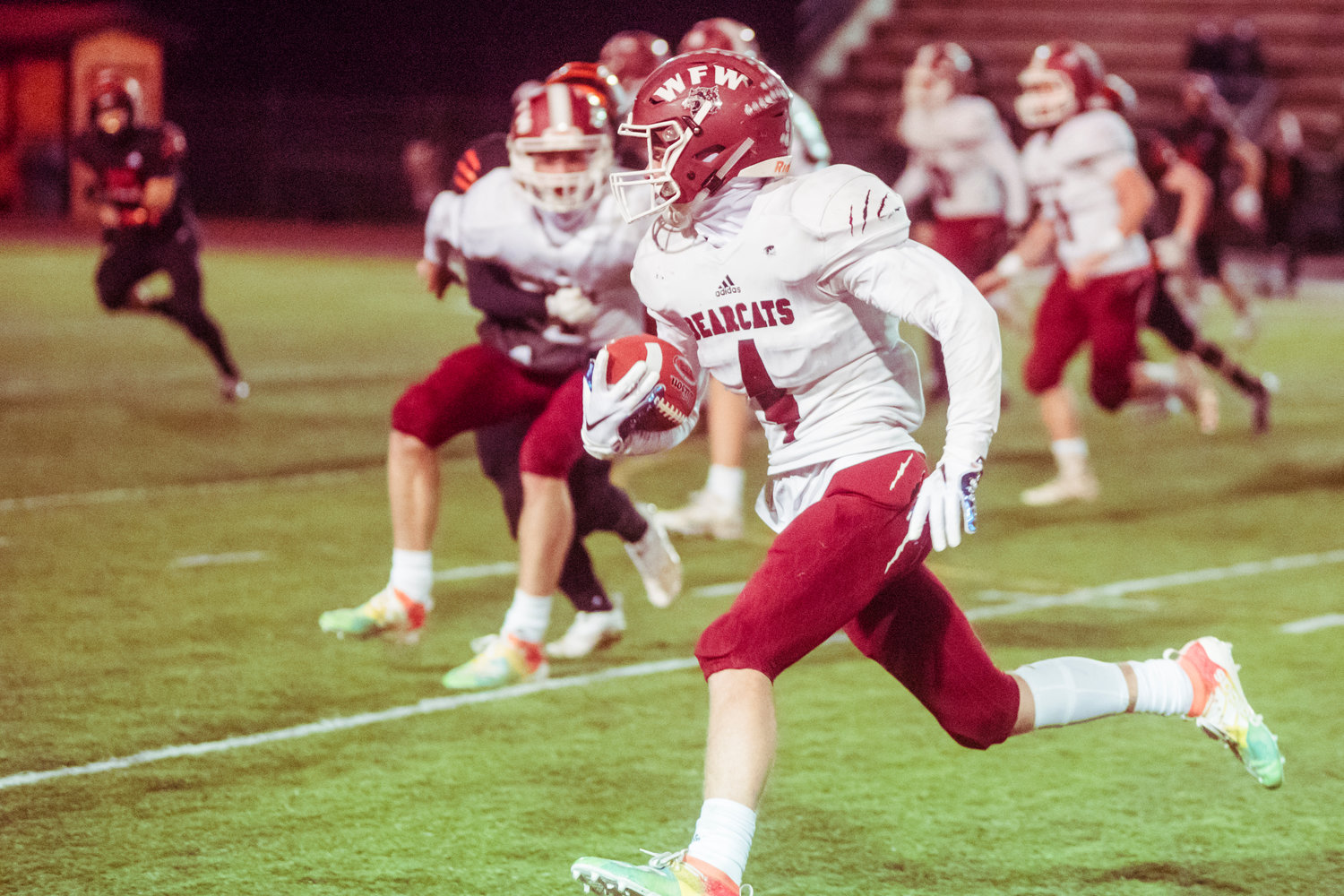 W.F. West's Cade Haller (4) runs with the football during the Swamp Cup game against Centralia Saturday night at Tiger Stadium.