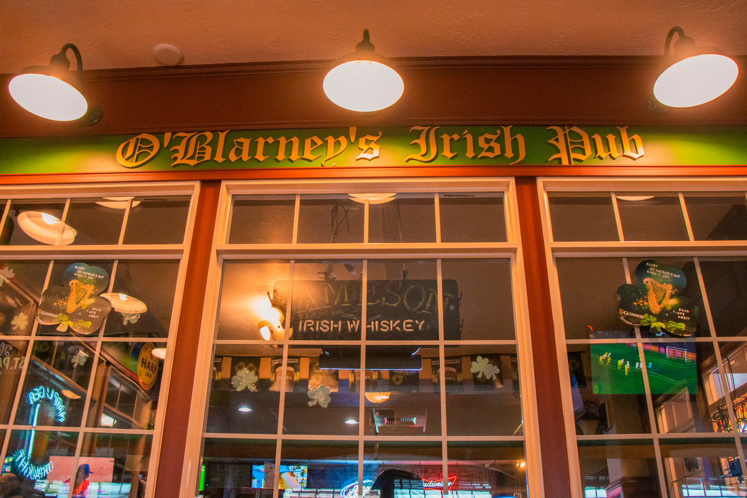 Televisions and neon signs dot the walls at O’Blarney’s in Centralia on Tuesday.