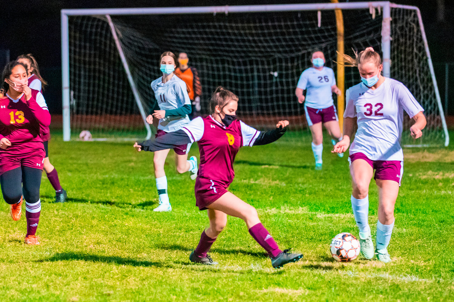 Cardinals’ Gabrielle Salgado (8) attempts to gain possession  during a game Wednesday night in Winlock.