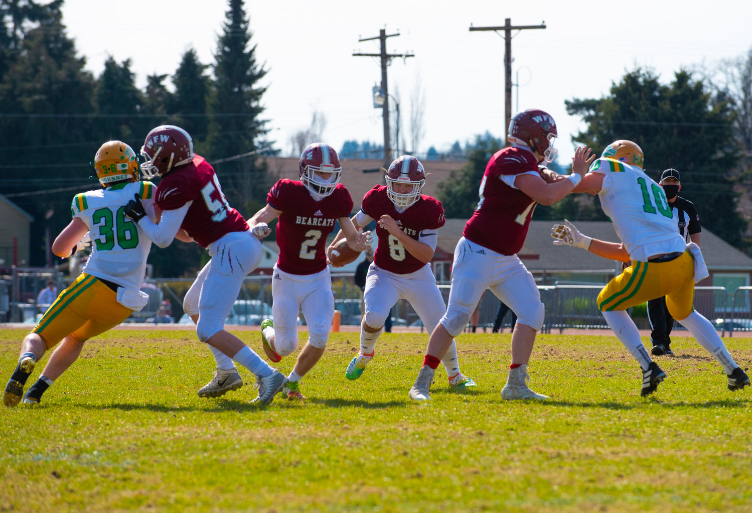 W.F. West quarterback Brit Lusk (8) finds an open seam against Tumwater on Saturday.