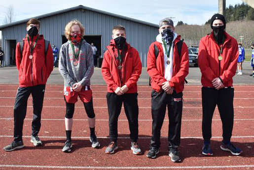 The Tenino boys cross country team won their second-straight 1A Evergreen Conference championship on Saturday in Hoquiam. From left, Braxton Williams (10th), Toby Suess (sixth), Carson Hart (fifth), Drew Hart (third) and Sam Hill, league champion for the second year in a row.