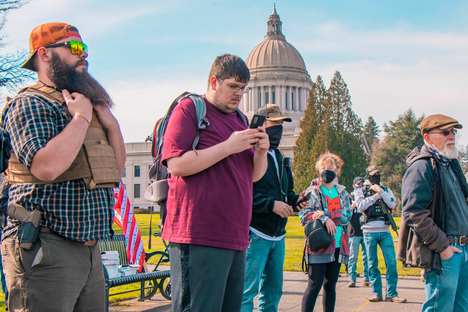 Protesters gather during a demonstration in support of open carry on Saturday near the Washington State Capitol Building in Olympia.